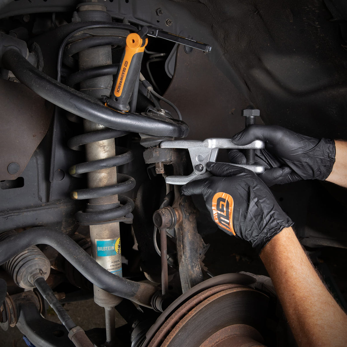 GEARWRENCH tool beside ruler showing scale and wide size range advantage
