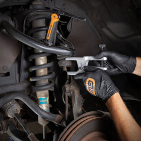 GEARWRENCH tool beside ruler showing scale and wide size range advantage