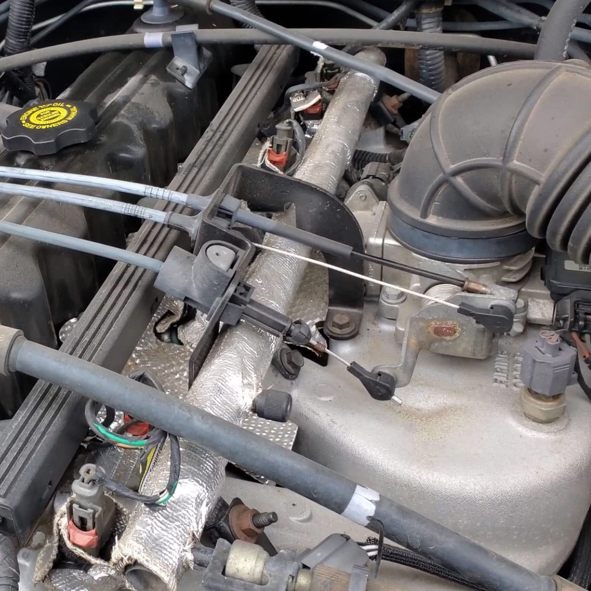 GEATaaT heat shield installed on Jeep engine demonstrating easy installation benefit