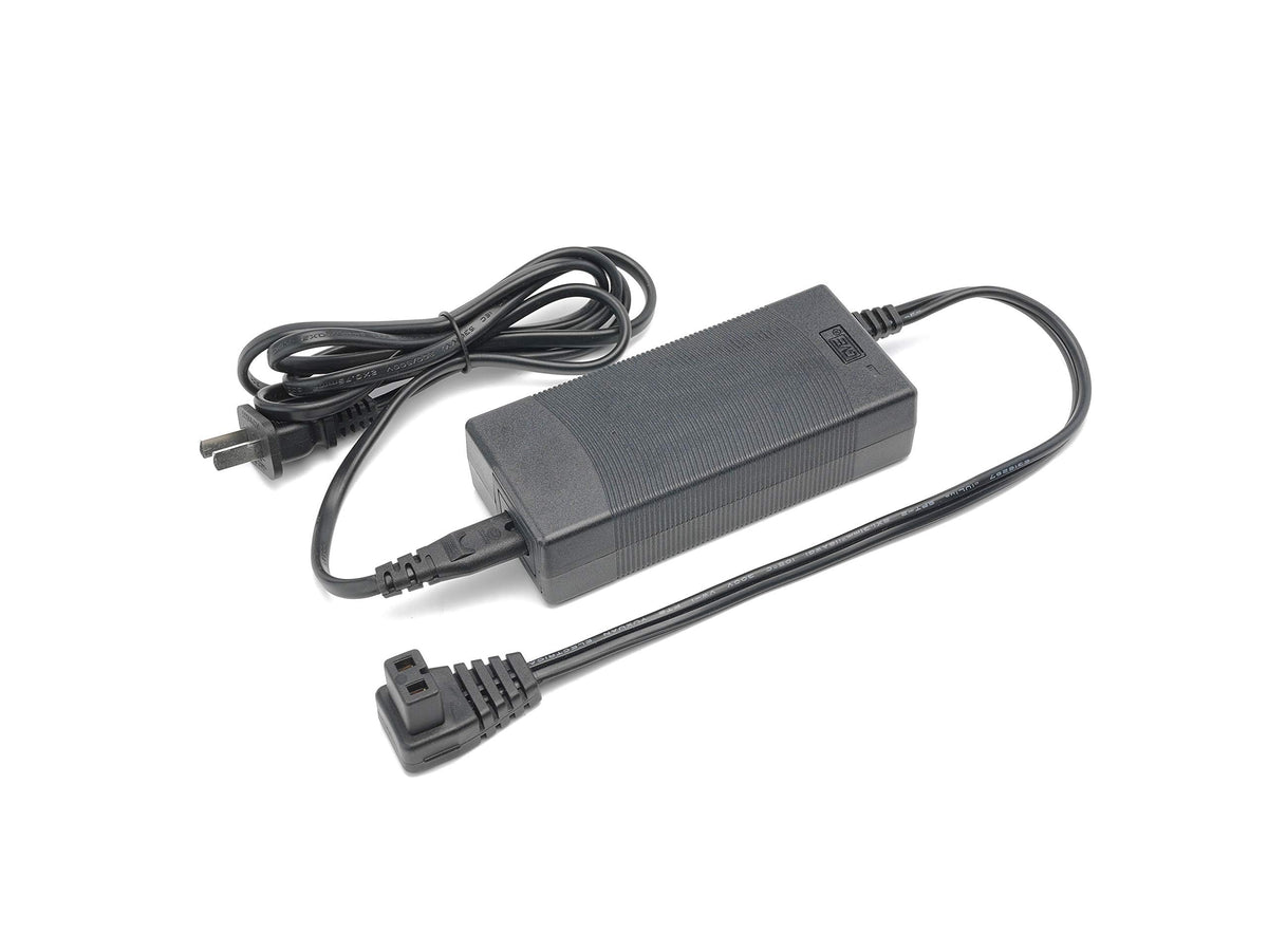 Geckoes AC adapter front view showing compact housing and ventilation for reliable cooling