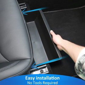 GEEDAR lifestyle shot in Tesla cabin showing clutter-free floor and tidy interior
