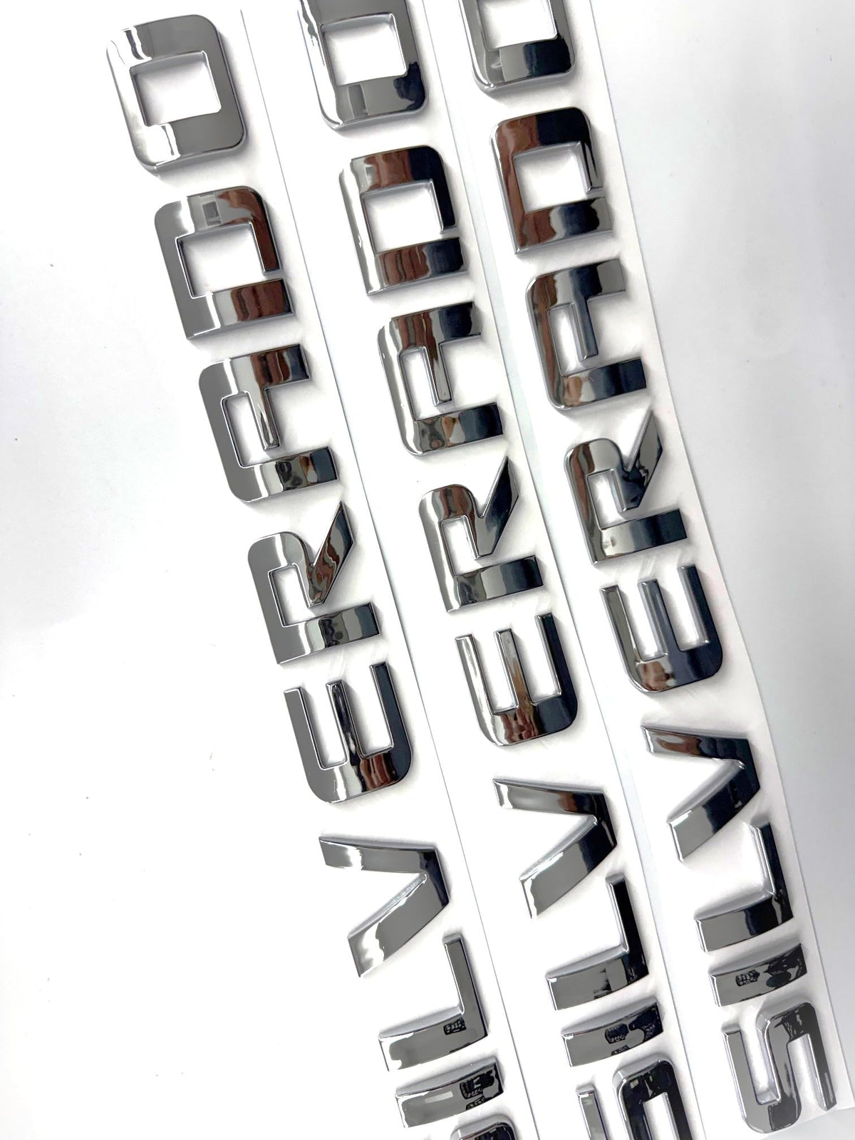 Generic badge side profile detail revealing edge contour and precise fit advantage