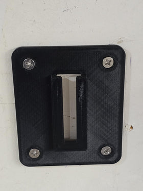 Generic mount held by hand for scale showing compact size and easy handling