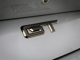 Generic GT emblem close-up texture showing ABS surface and durable finish benefit