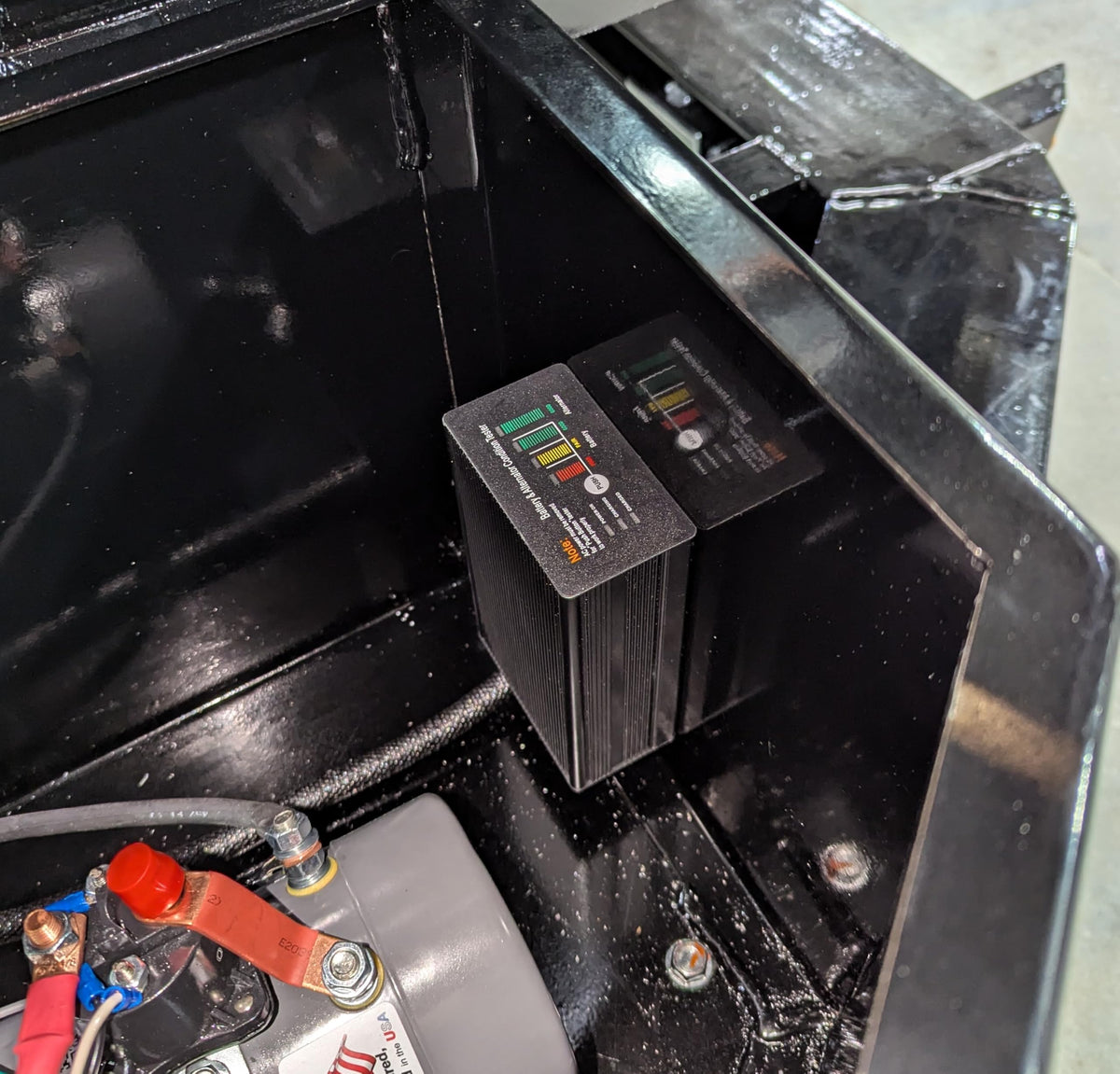Generic installed in dump trailer toolbox demonstrating secure mounting and access