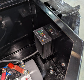 Generic installed in dump trailer toolbox demonstrating secure mounting and access