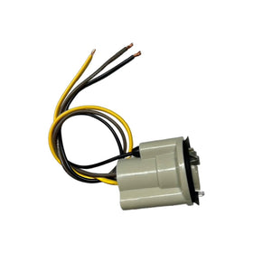 Generic socket installed in tail housing showing correct fit and improved function brand
