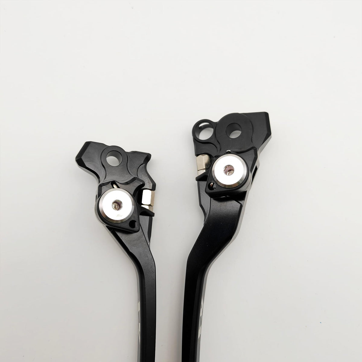 Generic lever folded and extended to show damage resistance and adjustable reach