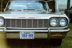 Generic Notre Dame frame installed on car demonstrating neat license plate protection and style