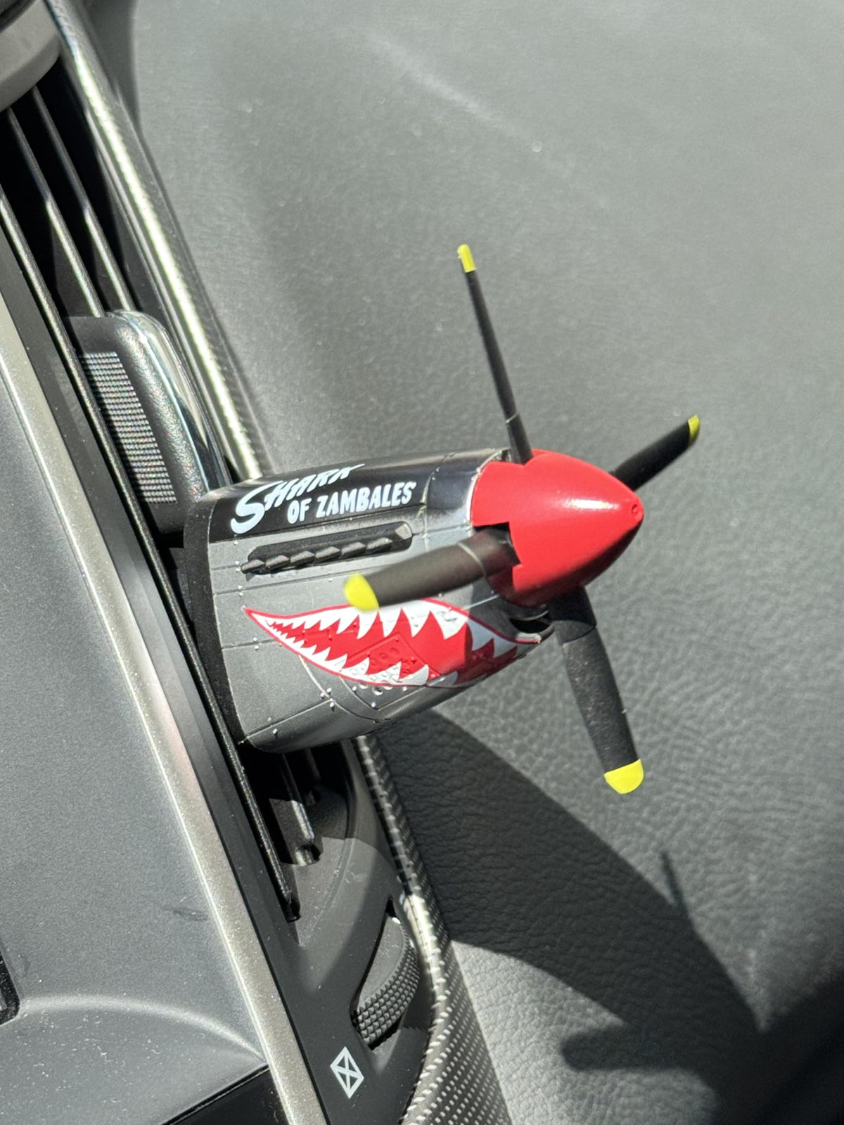 Generic P-51 installed on vent demonstrating secure clip and steady scent flow
