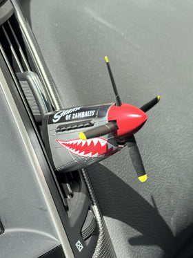 Generic P-51 installed on vent demonstrating secure clip and steady scent flow