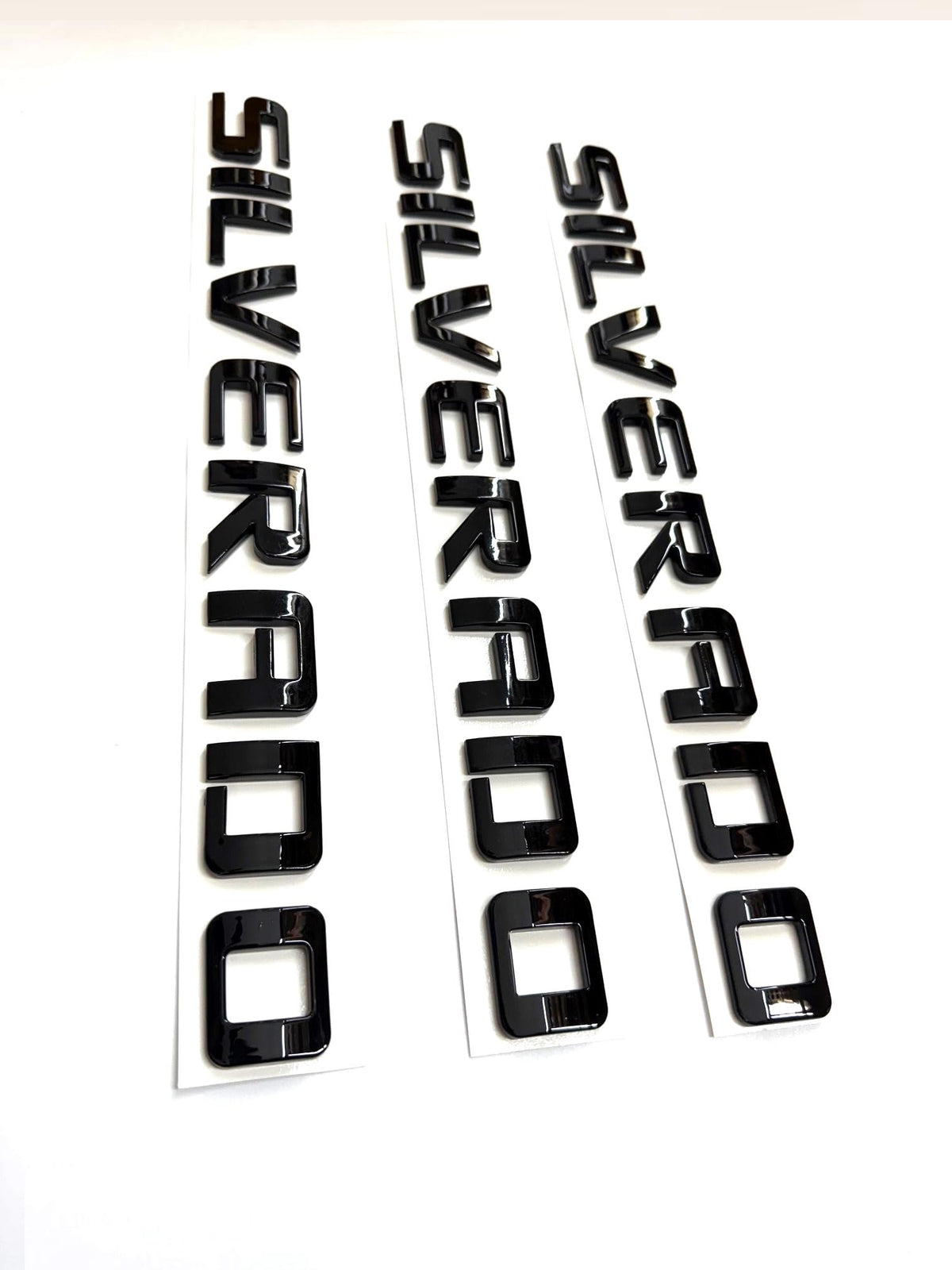Generic black emblems front view showing smooth finish and fit benefit