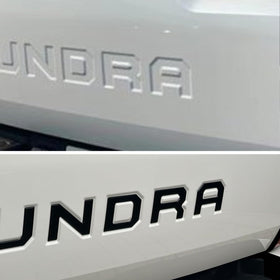 Generic brand size and scale comparison on Tundra tailgate showing fit accuracy