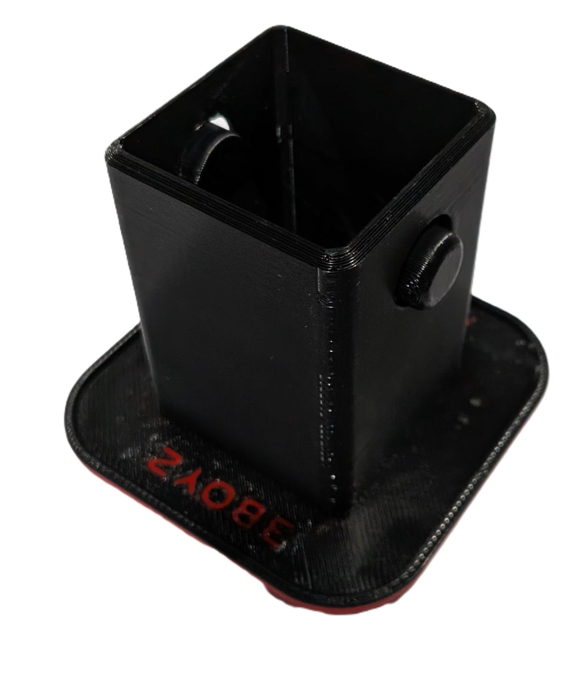 Generic ST hitch cover beside a ruler for size scale, demonstrates precise 2-inch receiver fit