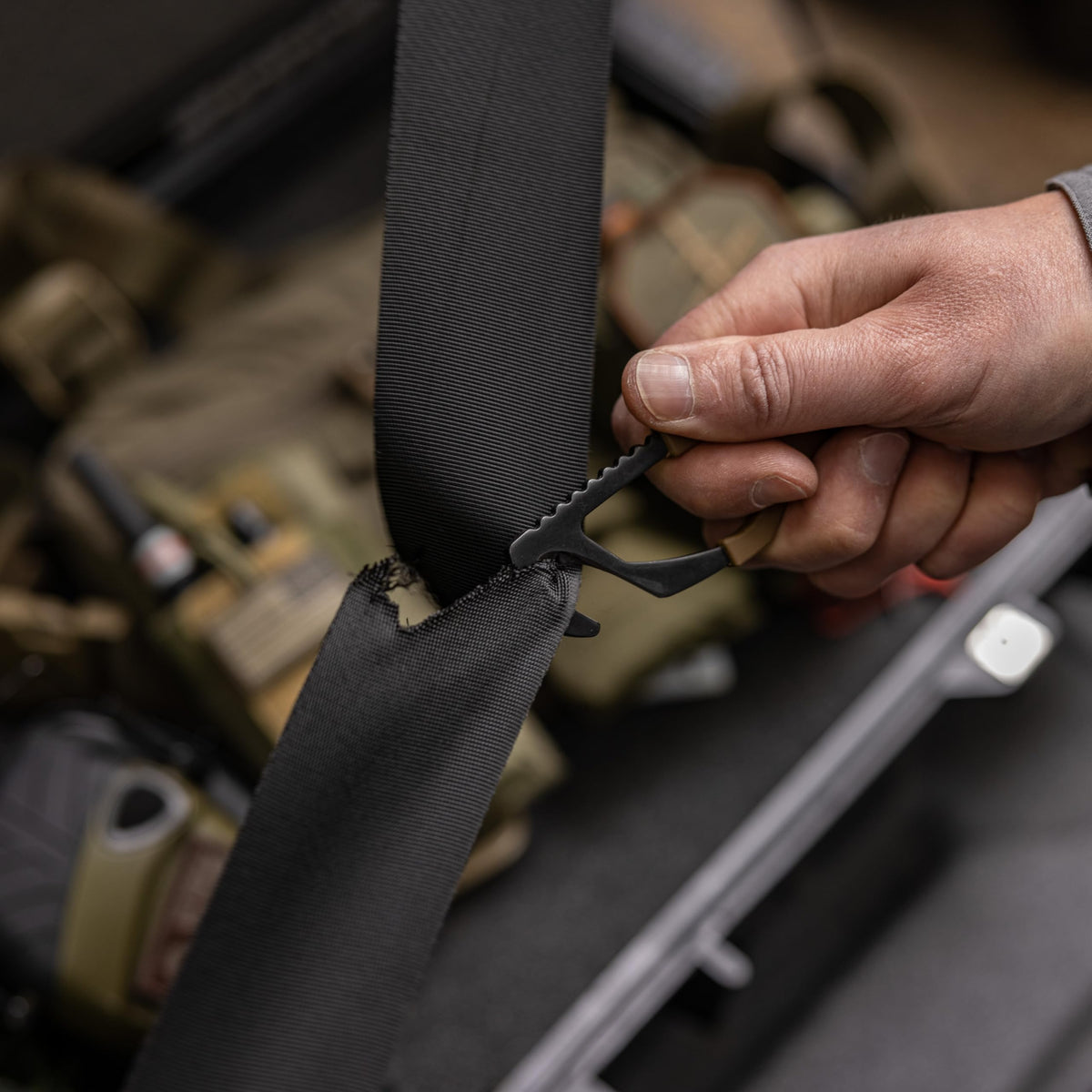Gerber attached to belt sheath and clip, demonstrating ambidextrous mounting