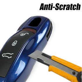GJinChangL key cover next to car key for size comparison and scale benefit
