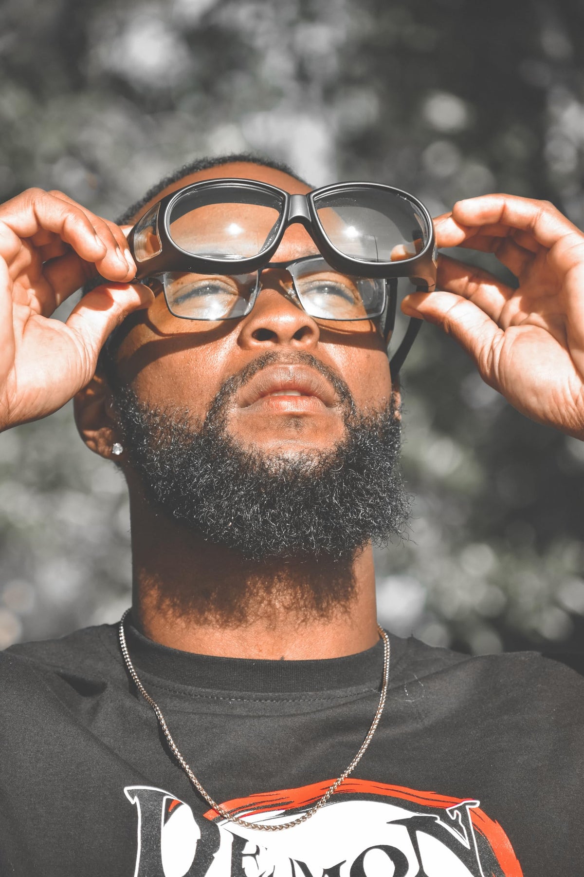 Global Vision clear-to-smoke lens comparison showing adaptive light control
