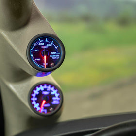 GlowShift close-up on red needle and calibrated dial for accurate coolant monitoring