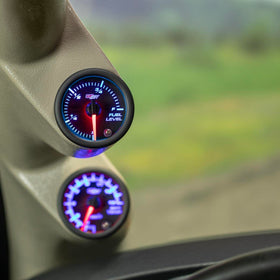 GlowShift lit gauge displaying multiple color modes for interior matching
