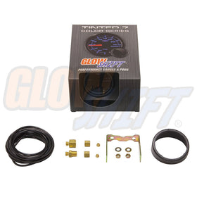 GlowShift gauge beside ruler showing 2-1/16 inch size for compact dash fitment
