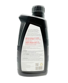 WIT WHATEVER IT TAKES TRANSMISSION PARTS, INC blue-tinted fluid pour close-up demonstrating easy identification and clarity