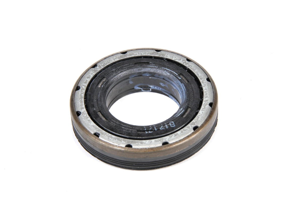 GM Genuine Parts axle seal close-up on shaft during installation for leak prevention