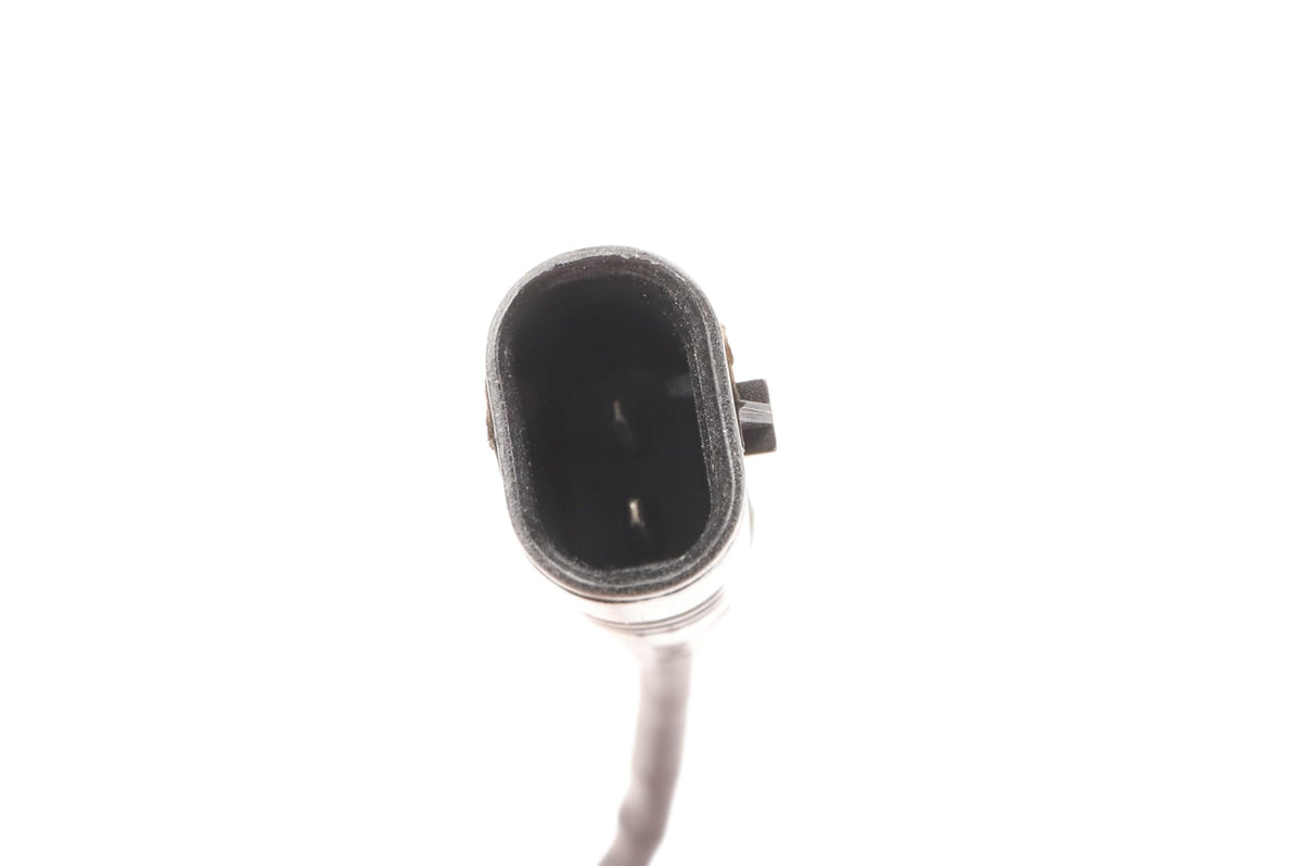 GM GENUINE PARTS sensor installed on brake assembly illustrating correct routing