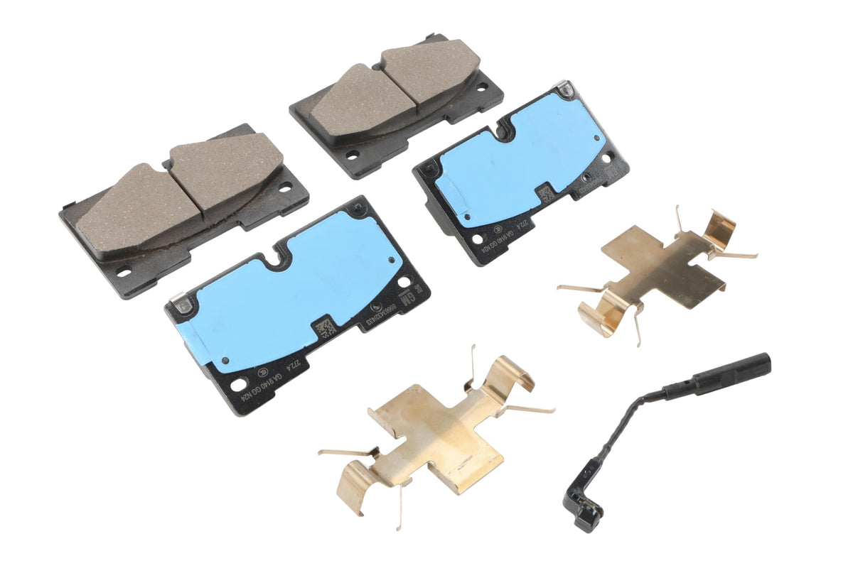 GM Genuine Parts 85663434 front pads shown installed on rotor, demonstrating reliable stopping