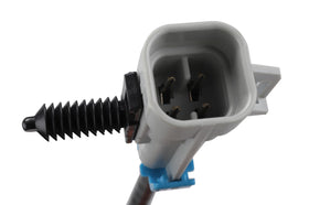 GM Genuine Parts oxygen sensor installed under vehicle demonstrating correct fit and restored emissions control