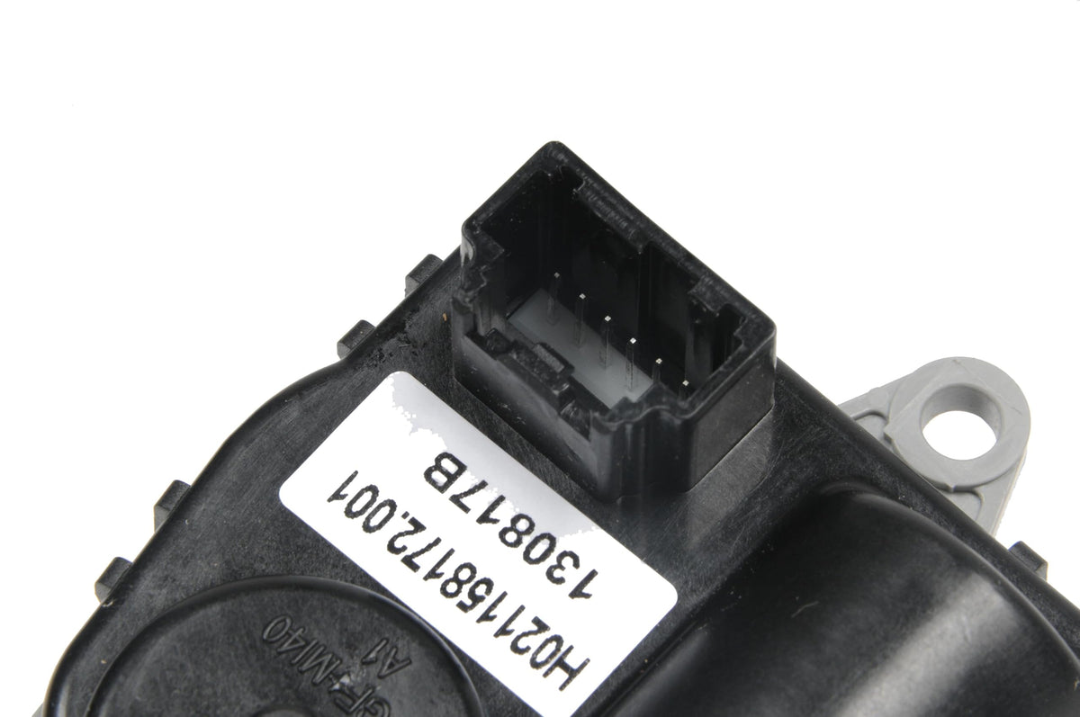 GM GENUINE PARTS actuator installed in HVAC housing demonstrating correct fit and improved temperature control