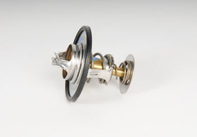 GM Genuine Parts thermostat installed in engine bay illustrating correct OEM fit