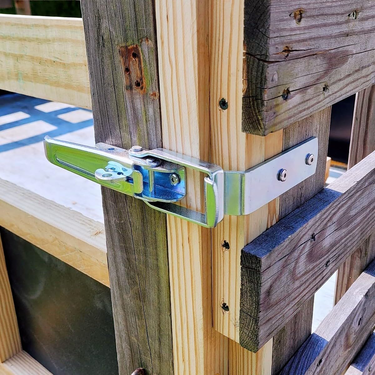 GMKD latch mounted on trailer gate providing stable travel security