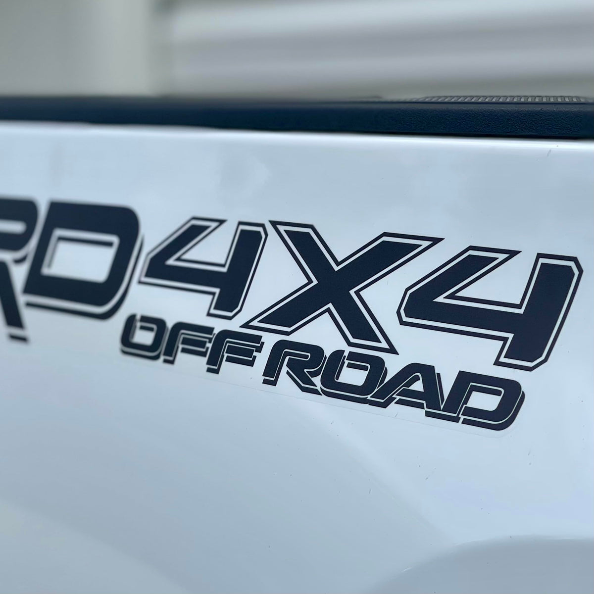 GO-GO.GROUP front bedside decal on truck showing clean OEM-like upgrade