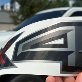 GOLD HOOK decal applied on Ford bedside showcasing authentic OEM look