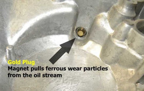 GoldPlug AP04 with washer and captured debris, GoldPlug helps monitor engine wear
