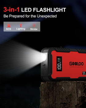 GOOLOO GT3000 next to a phone for scale showing portable, travel-friendly size