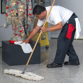 GrabaRag cloth polishing TV screen streak-free and protecting the display
