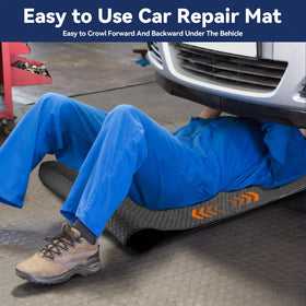 GreenThrive mat in use under a lifted car demonstrating low-clearance access