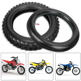 GREHUA tire next to ruler showing 14-inch scale for correct size confirmation