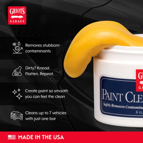 Griot's Garage clay bar in use on car door for removing embedded contaminants