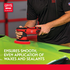 Griot's Garage pad next to hand showing 5.5 inch scale and easy control