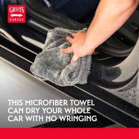 Griot's Garage towel drying car door to speed drying and reduce streaks