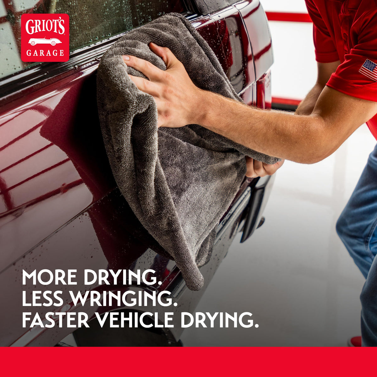 Griot's Garage towel next to vehicle wheel showing 29x36 size scale