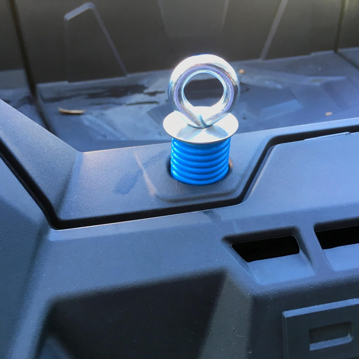 GripPRO beside a 1-inch hole for clear size and fit reference