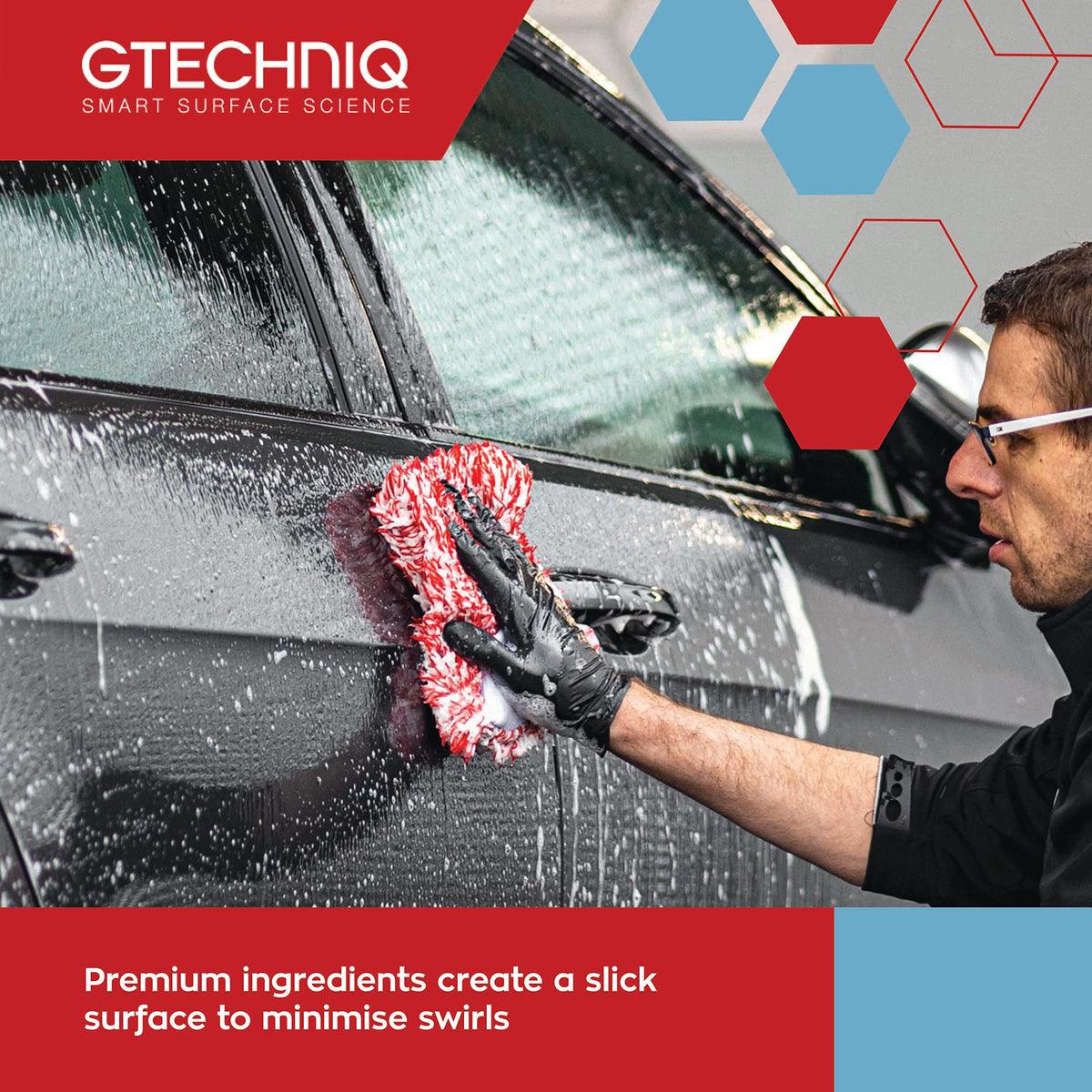 Gtechniq 500ml bottle next to car key for size comparison