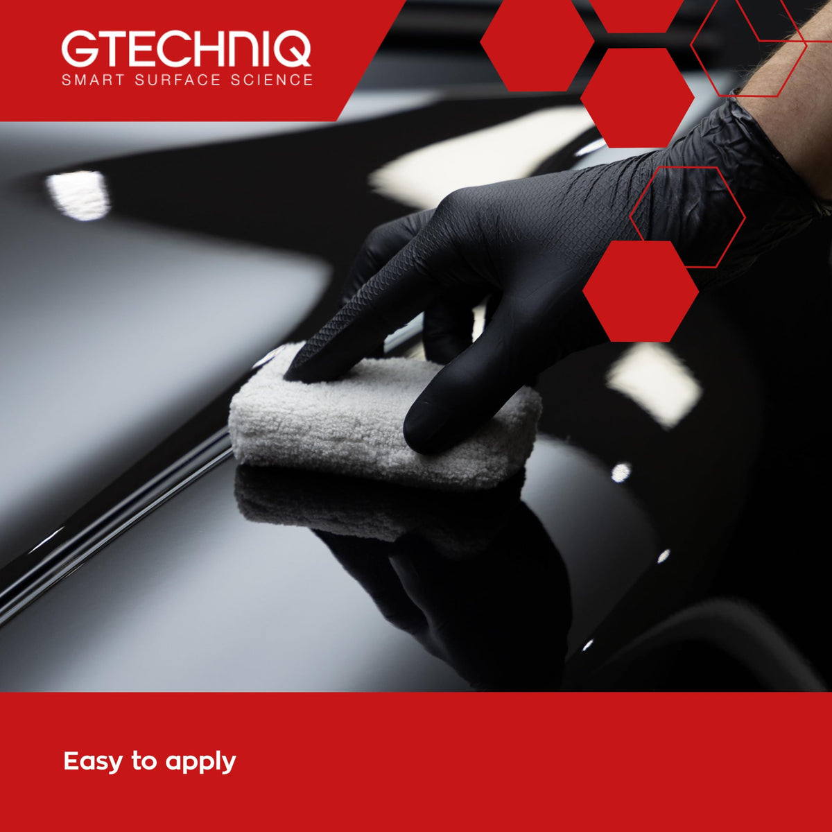 Car hood coated with Gtechniq showing deep gloss and water beading