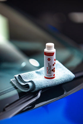 Gtechniq G5 bottle beside a ruler to show 3.4 fl oz size for kit planning