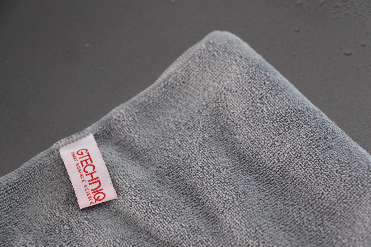 Gtechniq MF1 edge and stitch detail highlighting durable construction and lint-free use