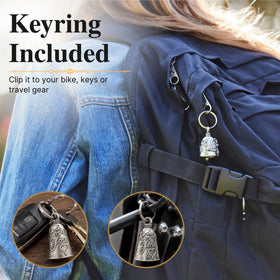 Guardian Bell praying hands hanging from a backpack zipper for everyday use