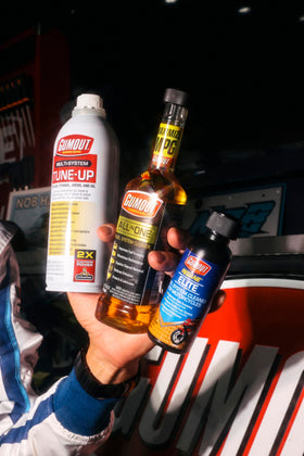 Gumout close-up of nozzle and label highlighting usage instructions